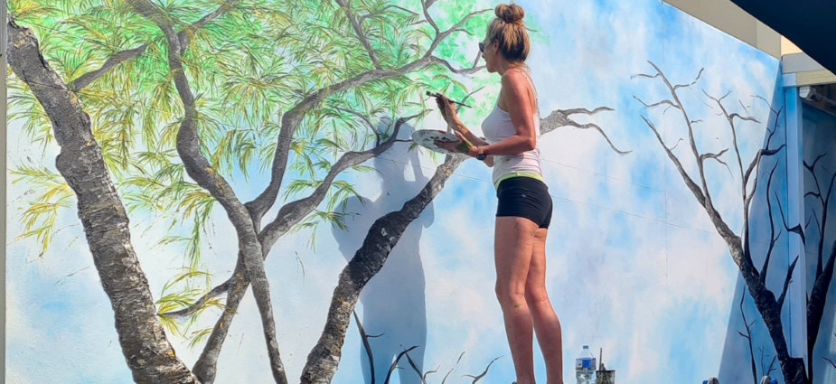 Tracie Eaton painting mural